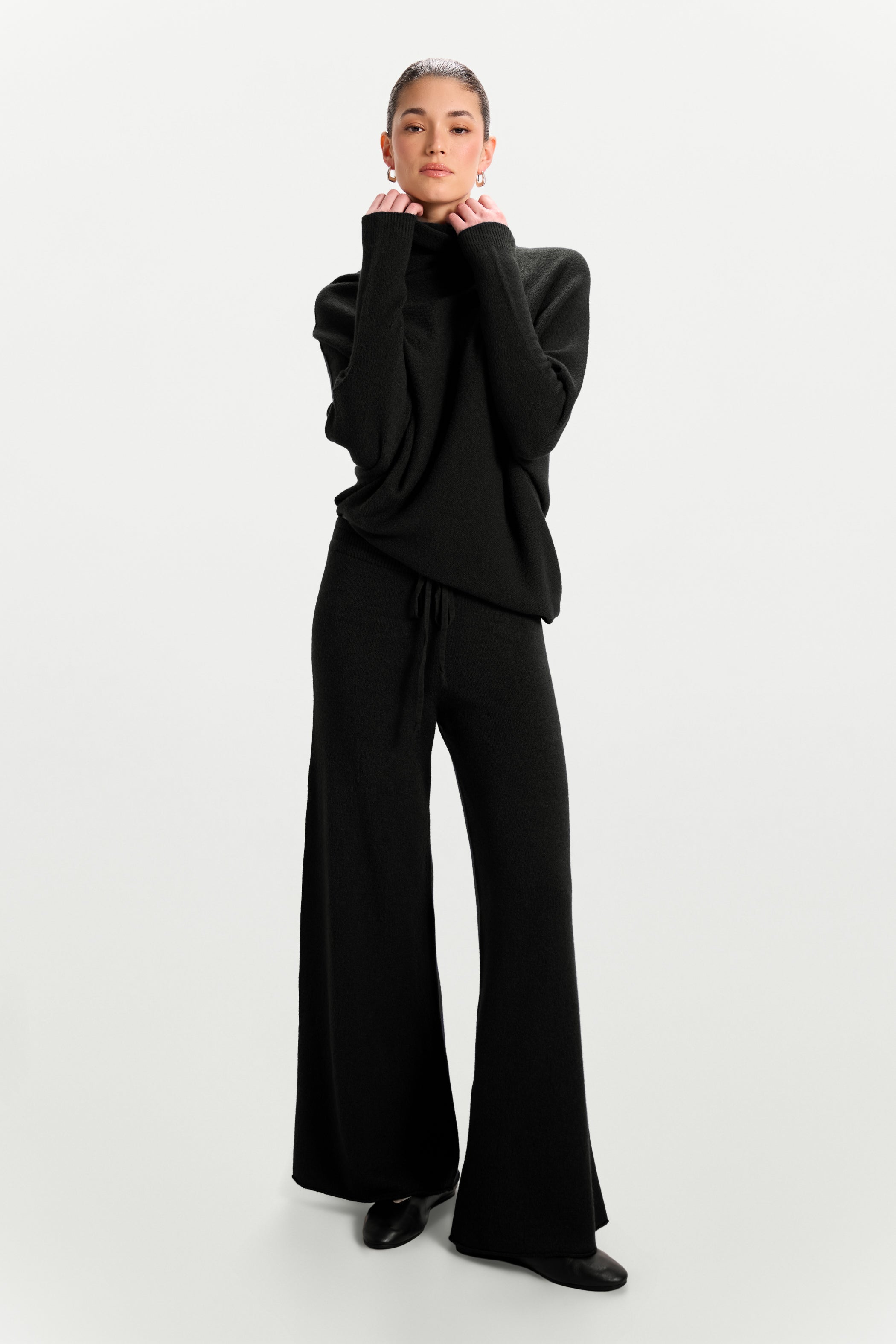 Asymmetric Draped Roll Neck | Black | Seamless Knit