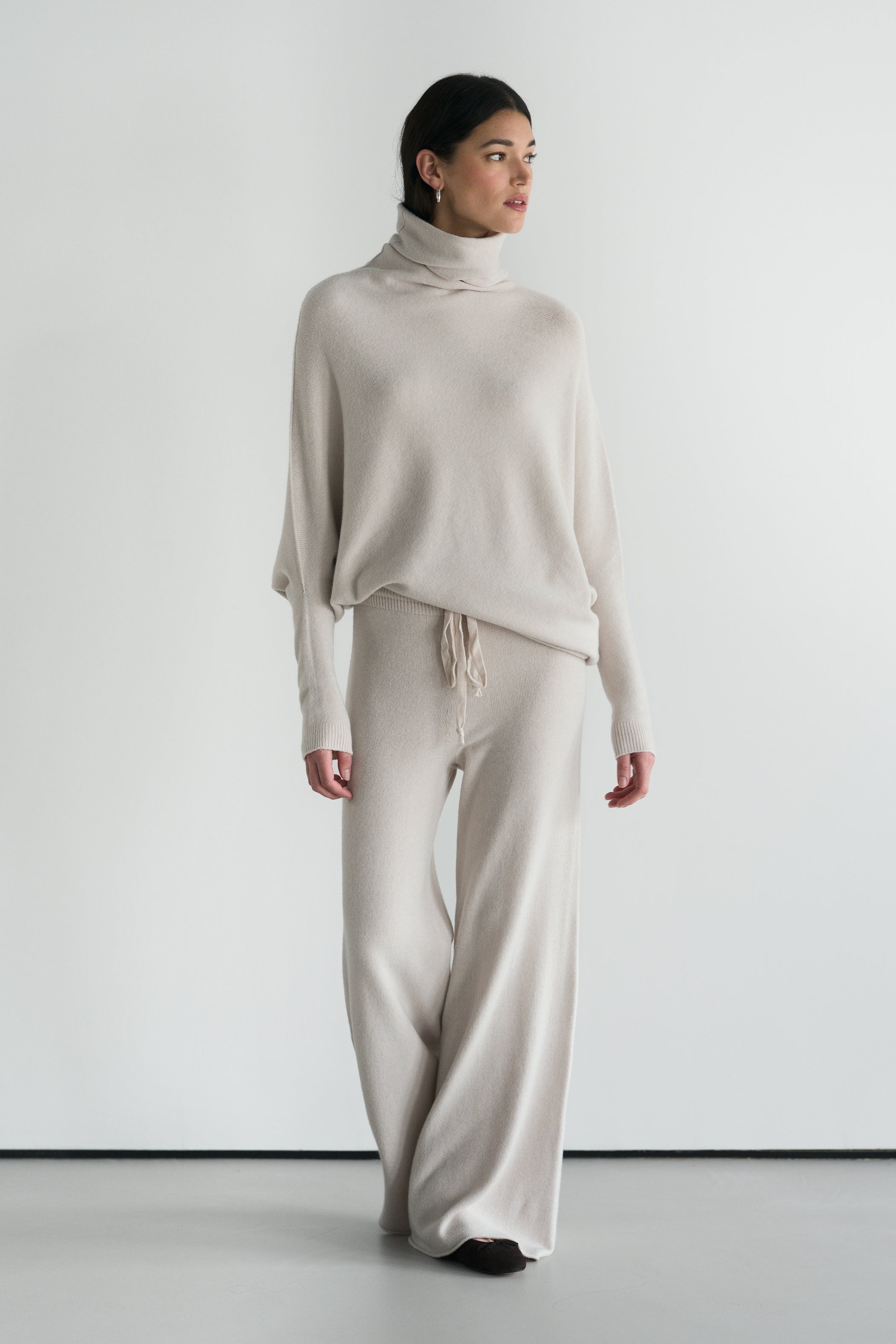 Asymmetric Draped Roll Neck | Light Beige | Seamless Knit
