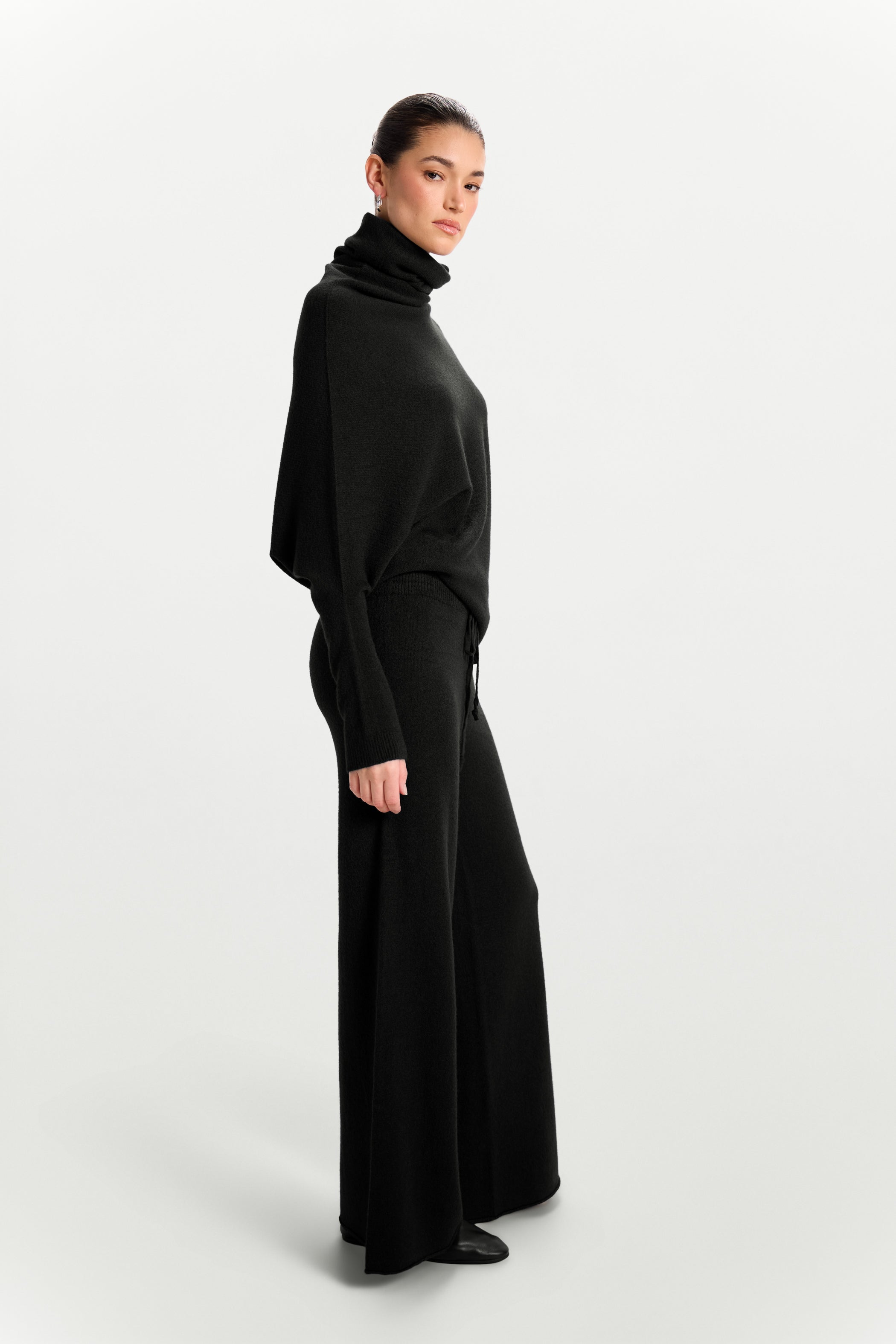 Asymmetric Draped Roll Neck | Black | Seamless Knit